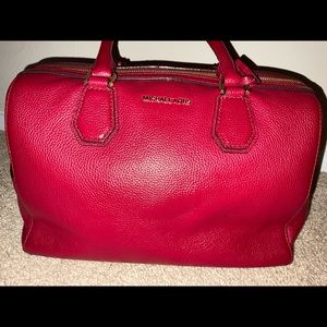 Gently used Michael Kors Leather Bedford handbag in Cherry.